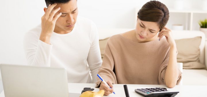 husband and wife with financial stress