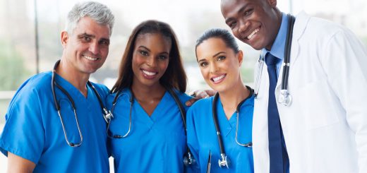 group of happy multiracial medical team in hospital