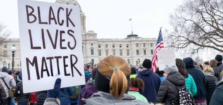 ST. PAUL, MN/USA - MARCH 24, 2018: Unidentified individual carrying Black Lives Matter sign at the March for our Lives protest at the Minnesota State Capitol.