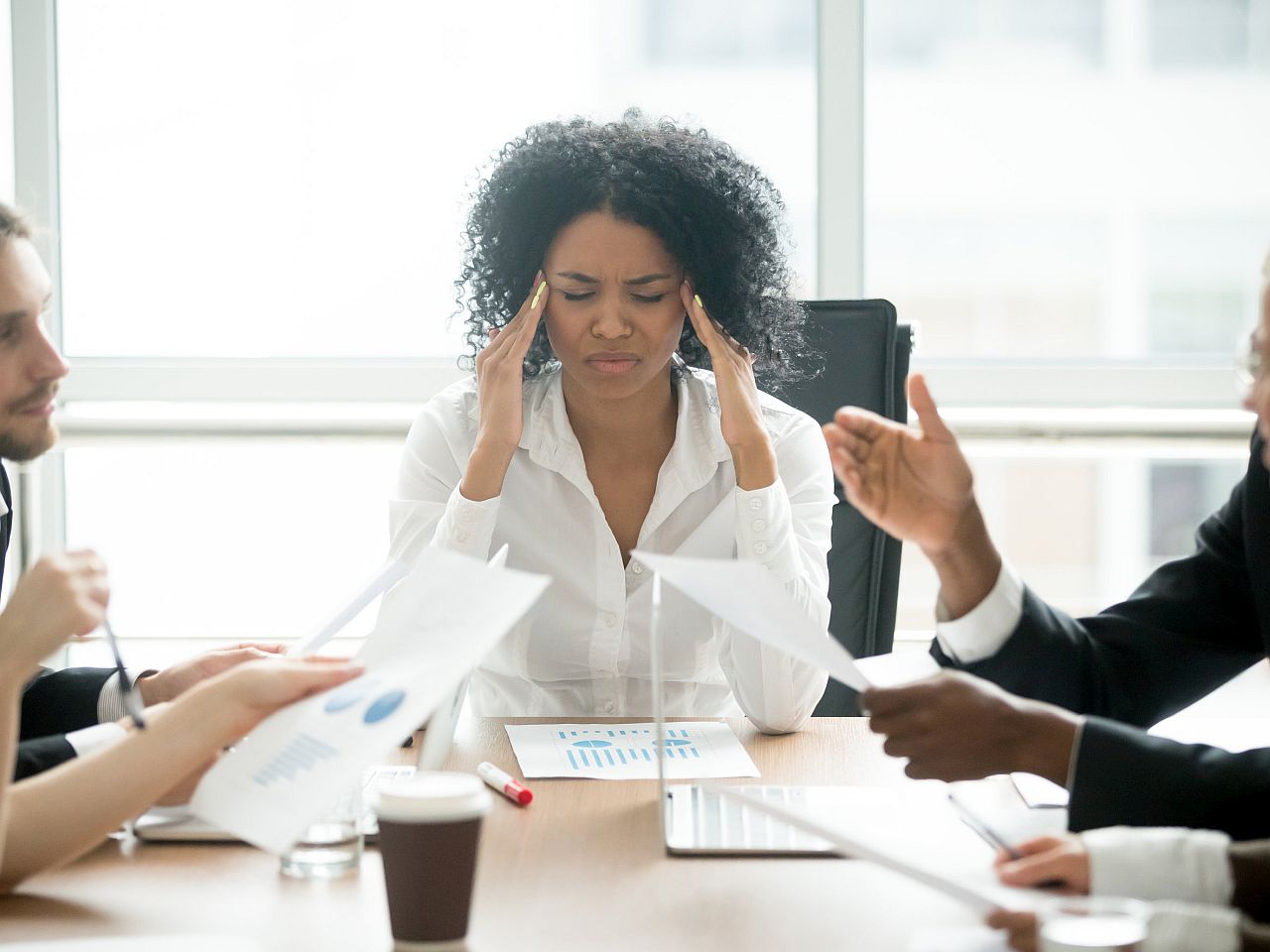 Stressed overwhelmed worker feels tired at corporate meeting; union's first contract concept