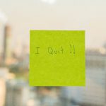 Postit with "I Quit" message on office window; Great Resignation labor unions concept