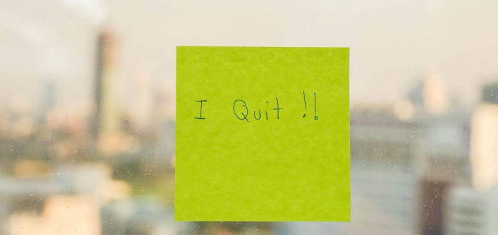 Postit with "I Quit" message on office window; Great Resignation labor unions concept