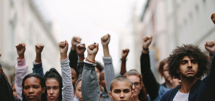 Activists protesting on the street; worker unions gains concept