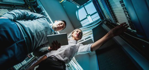 Young engineers in network server room; union drives spring 2022 concept