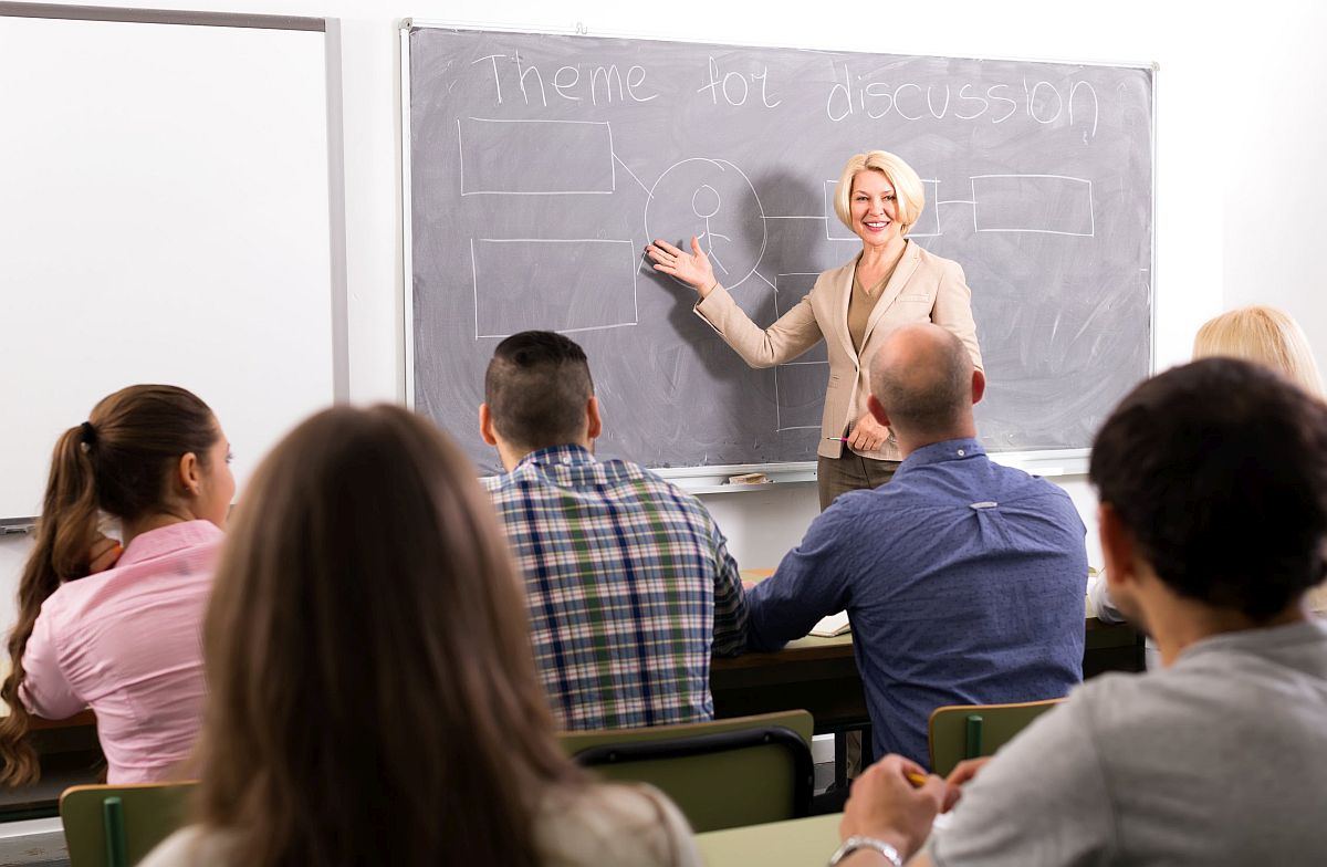 adults in classroom listening to teacher; concept next generation of workers