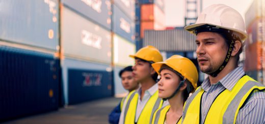 Group of workers standing in container yard; choosing a union concept