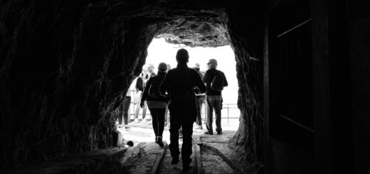 People at entrance to mine; warrior met coal strike concept