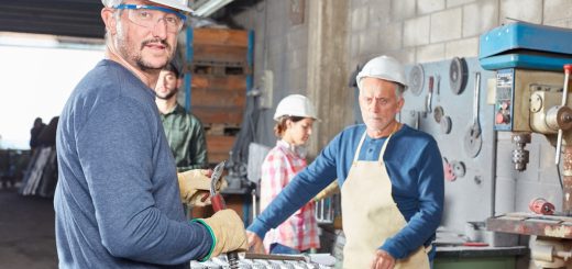 Workers in shop; union dues myths concept