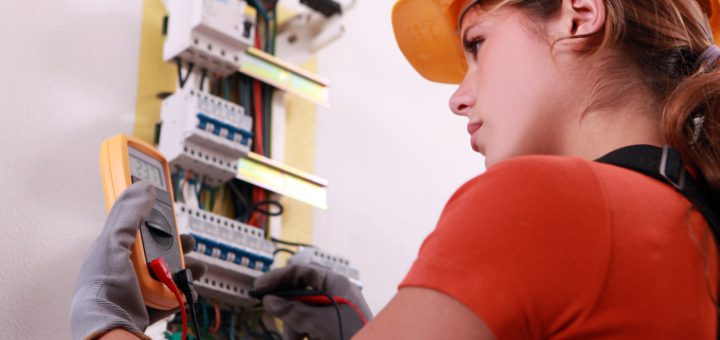 Electrician at work; electrician shortage concept