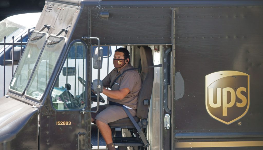 UPS driver in a truck; UPS workers concept