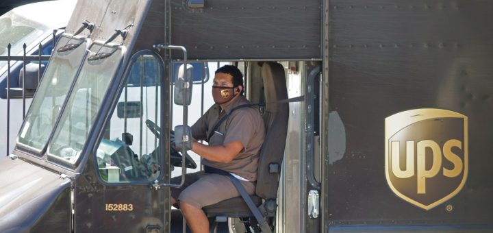 UPS driver in a truck; UPS workers concept