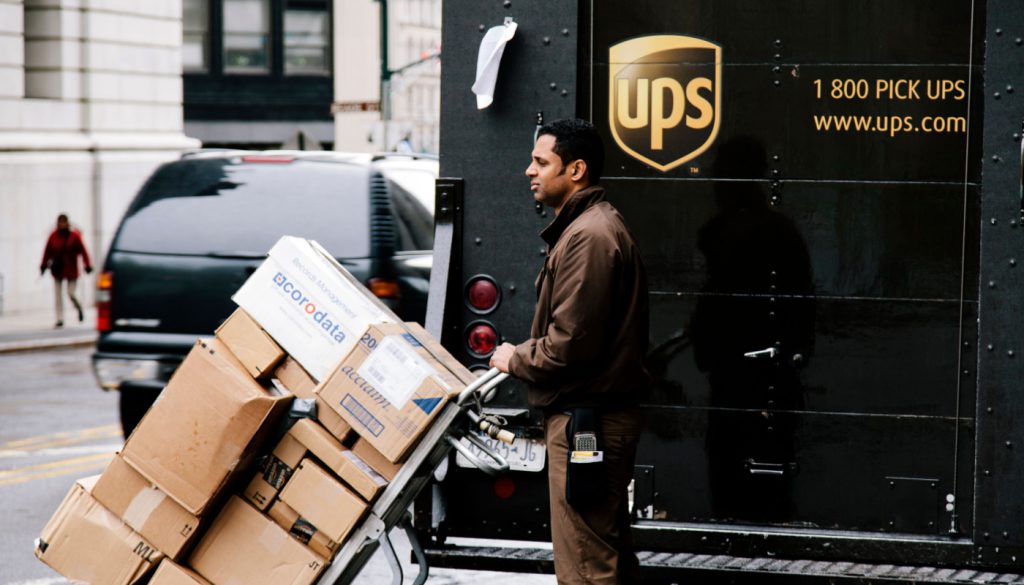 UPS worker delivering packages; UPS workers concept