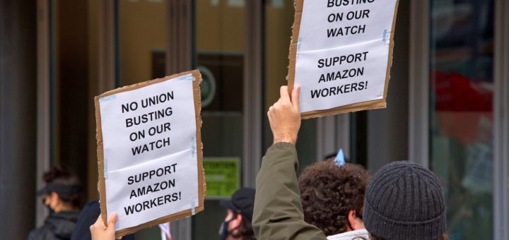 workers protesting Amazon's treatment of employees and their attempts to bust up formation of a union;